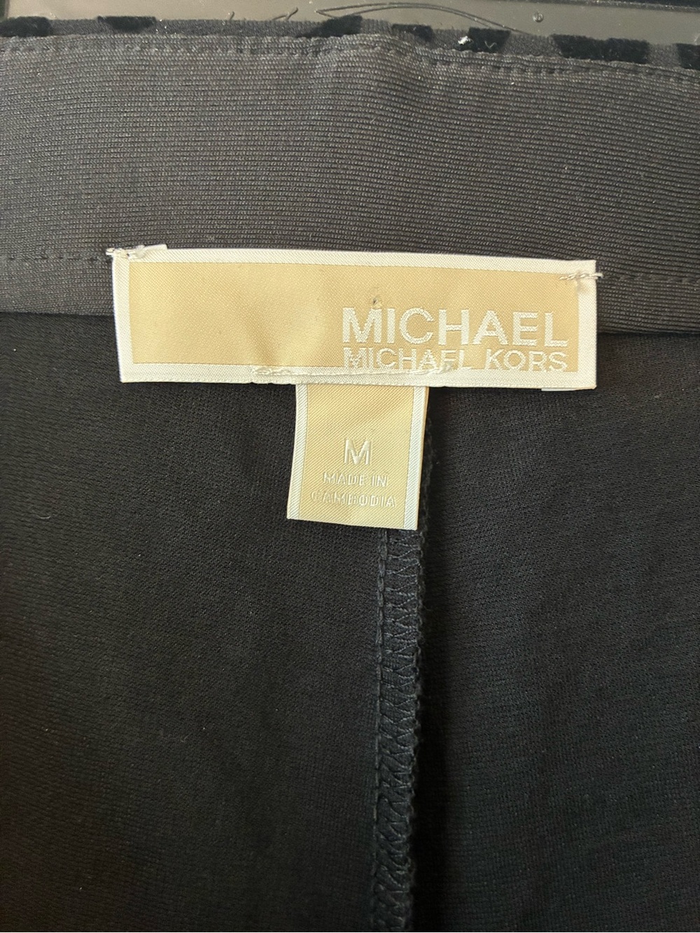 MICHAEL KORS Women’s Stretchy Pant with a Black on Black Cheetah Pattern